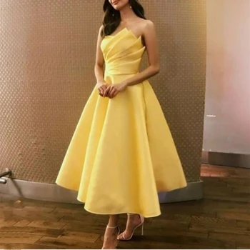 Элегантные желтые короткие платья для выпускного вечера без бретелек 2023 трапециевидной формы, чайной длины, плиссированные атласные вечерние платья для вечеринок с карманами